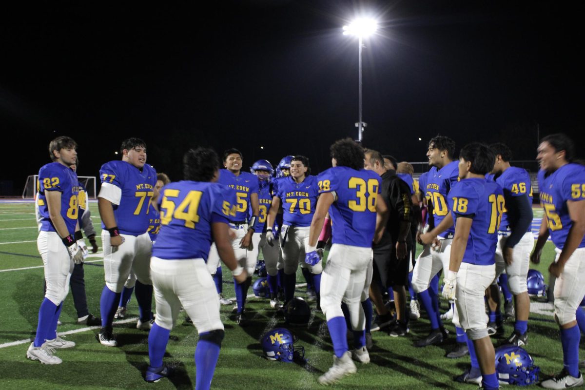 The Mt.Eden football team celebrates their victory.