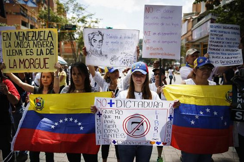 Venezuelan students join together to protest.