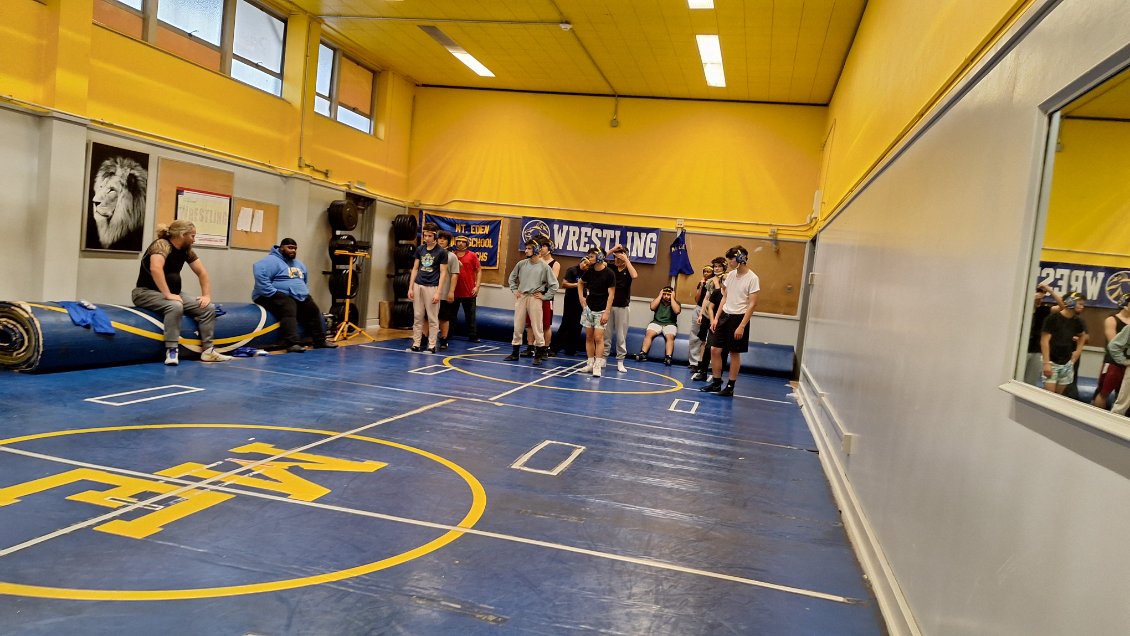 The wrestling team during practice.