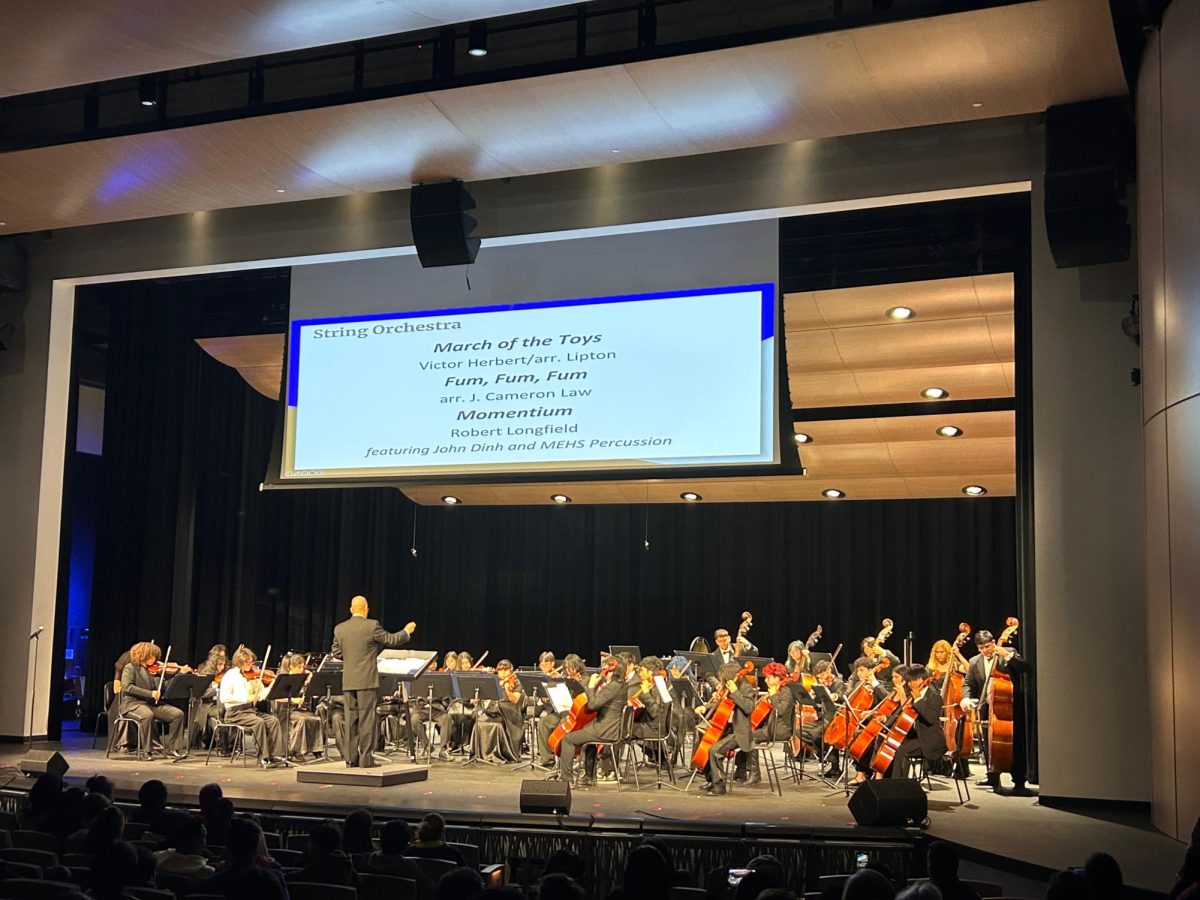 Mt. Eden String Orchestra takes the stage.