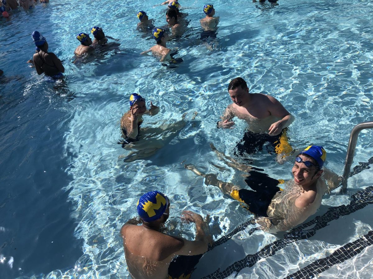 Mt. Eden swim team chilling in the pool.