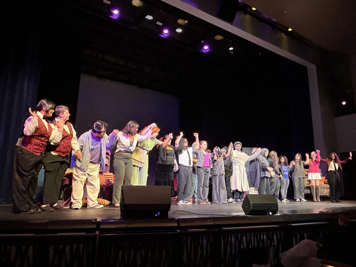The actors take a bow after their performance.