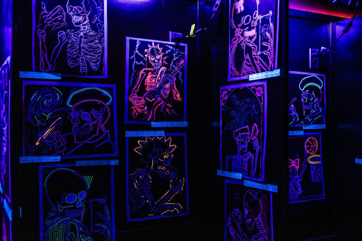 Carrie King’s art students’ work on display in the "Art in the Dark" exhibit.