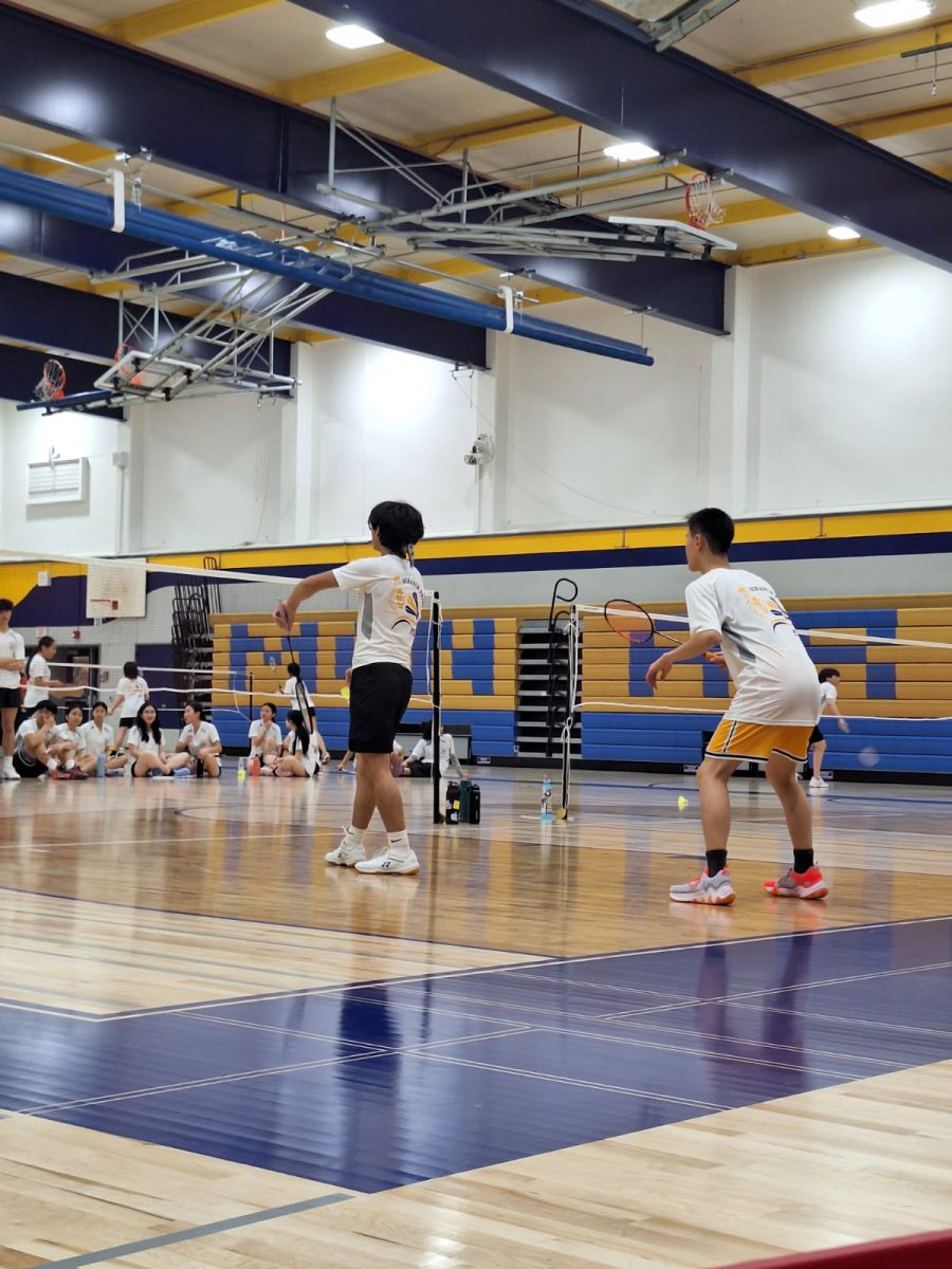 Senior Mathew Alcantara and sophomore Wilson Zeng in a boys doubles varsity match.